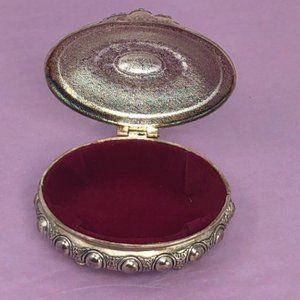Silver plated, oval, orbits design footed jewelry box